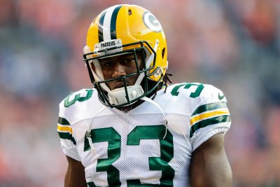 Aaron Jones' suspension puts slight cog in Packers' "committee" plans