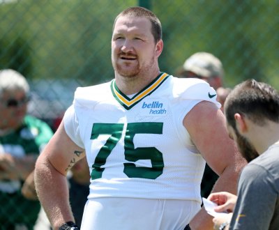 Bryan Bulaga Passes Physical, Cleared to Begin Practicing in Limited Capacity
