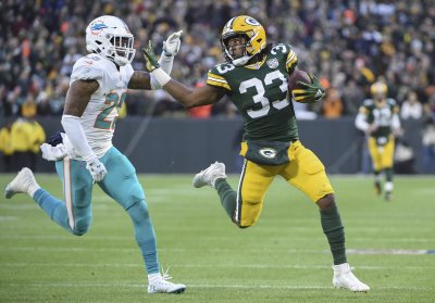 Packers remain undefeated at home, beat Dolphins 31-12 
