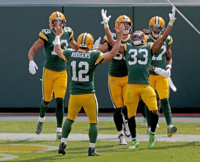 Packers 42   Lions 21:   Game Balls and Lame Calls