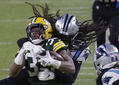 Packers 24   Panthers 16:    Game Balls and Lame Calls