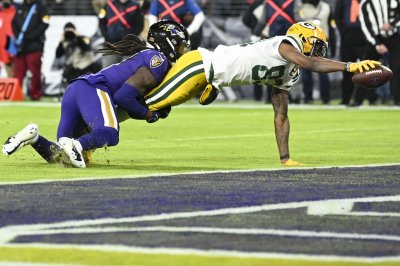 Packers 31  Ravens 30:  Game Balls and Lame Calls
